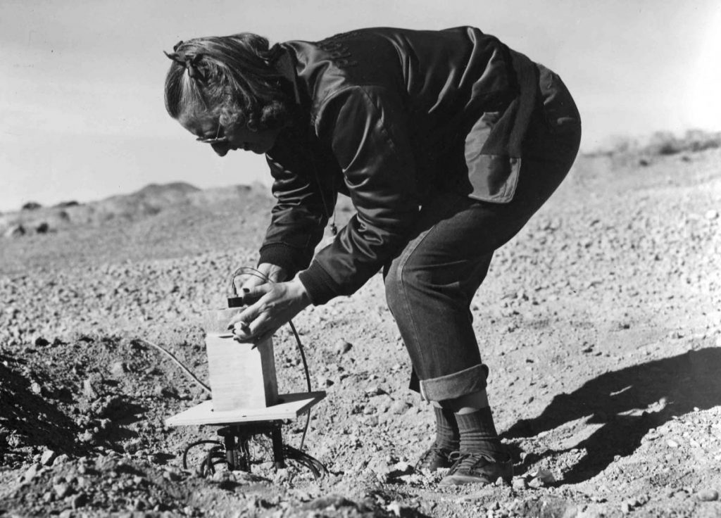 Frances Dunne working in Bayo Canyon. Image courtesy of the Los Alamos Historical Society.
